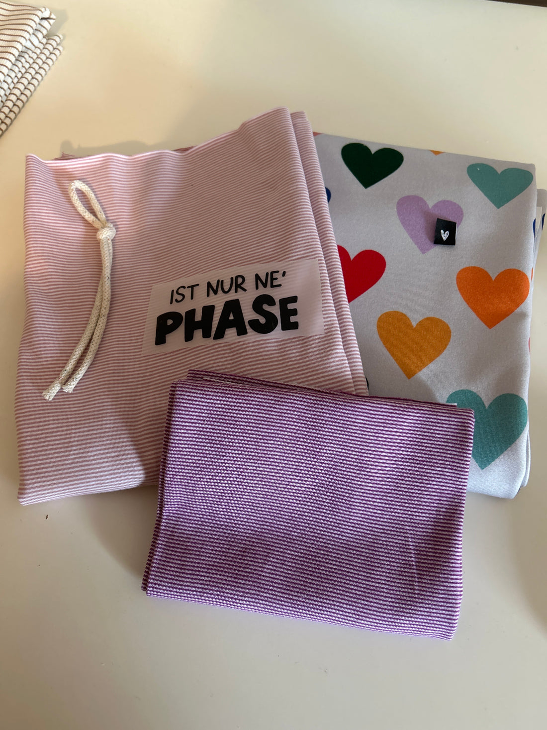 Kombipaket Goodbye 50% Herzen bunt Jersey mit rosa